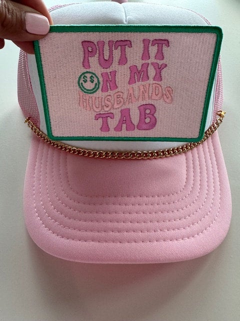 Put It On My Husbands Tab Trucker Hat Put It On My Husbands Tab Trucker Hat